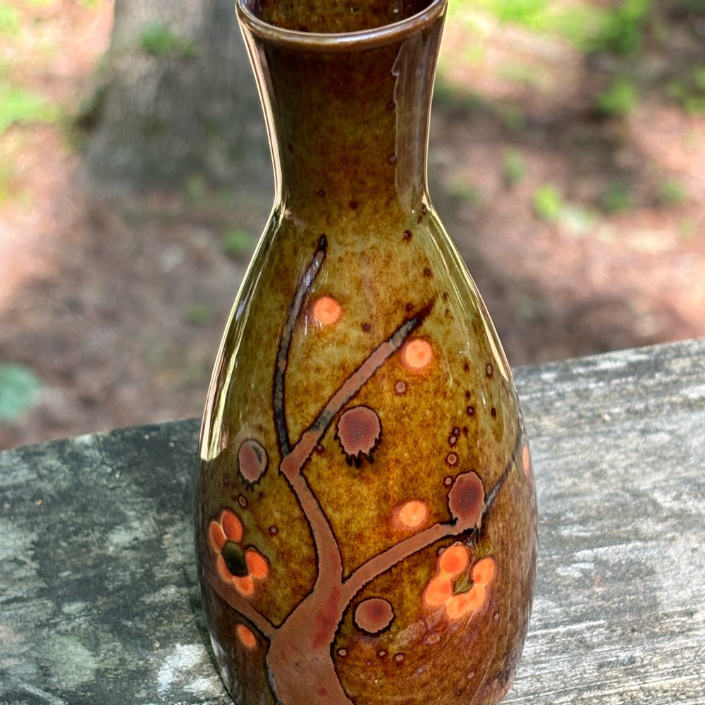 Small brown and green pottery Japanese vase.